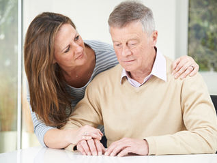 Aging parent with dementia and family caregiver daughter