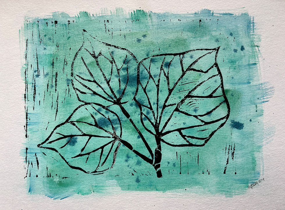 Kawakawa leaves shown on a linocut print