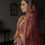 Thumbnail: Unique bridal lehenga in maroon with green dupatta