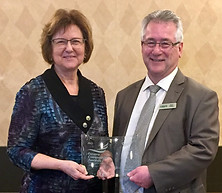 SOS volunteer and board member Wilma Sotas, Casera CEO Brent Thomas
