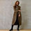 Thumbnail: the long frink in golden brown, black and camel bouclé