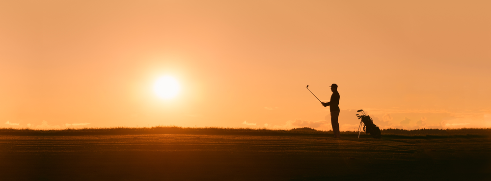 sunset golfer silhouette