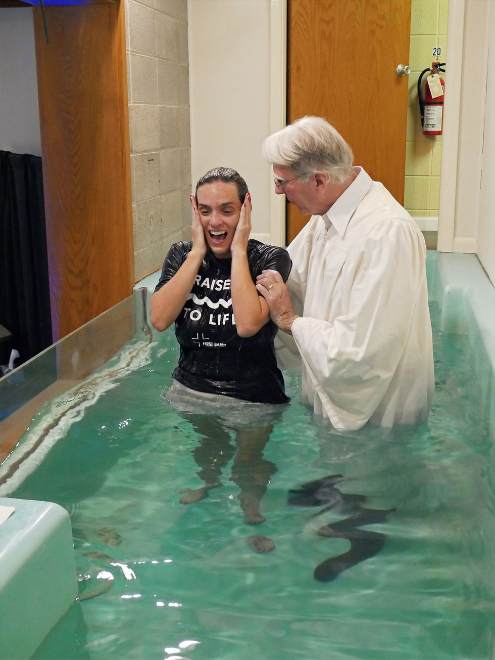 Woman being baptized