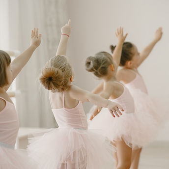 cute-little-ballerinas-pink-ballet-costume-children-pointe-shoes-is-dancing-room.jpg