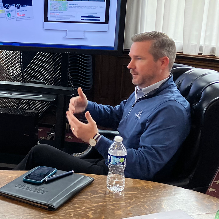 Charles Parker meeting with a client