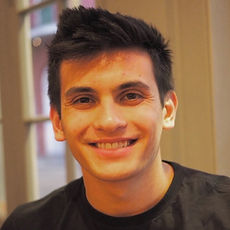 Tom_Wang_Headshot.jpeg