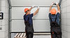 repairmen working on a door.jpg