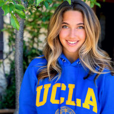 CAITLIN D.