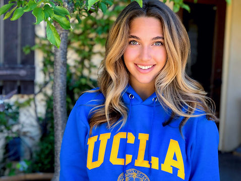 CAITLIN D.