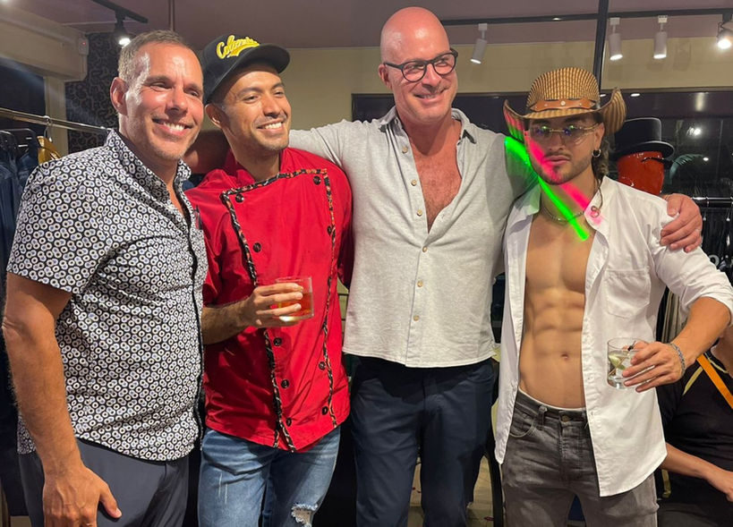 Guests enjoying handcrafted cocktails and gourmet finger foods at the DiningOUT Pop-Up Party in Medellín—an OUT in Colombia social event that blends queer connection and flavor on a luxury Colombia gay travel journey.