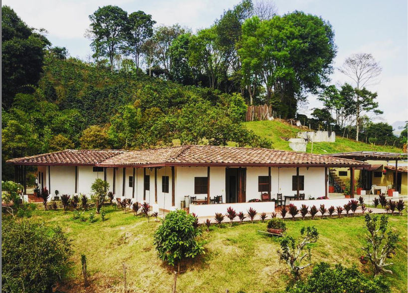 Traditional Colombian coffee farm near Medellín, where OUT in Colombia guests learn how coffee is harvested, processed, and brewed fresh.