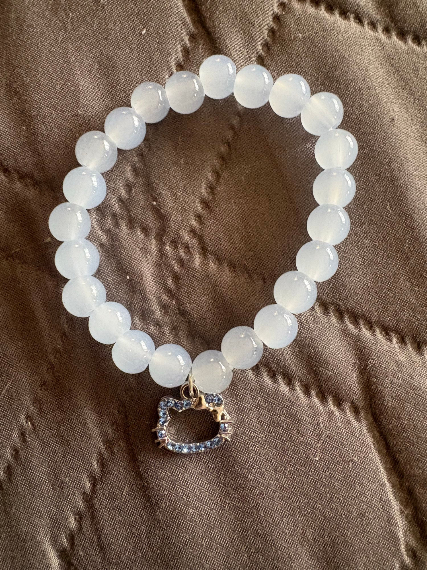 Hello kitty light blue pearl 