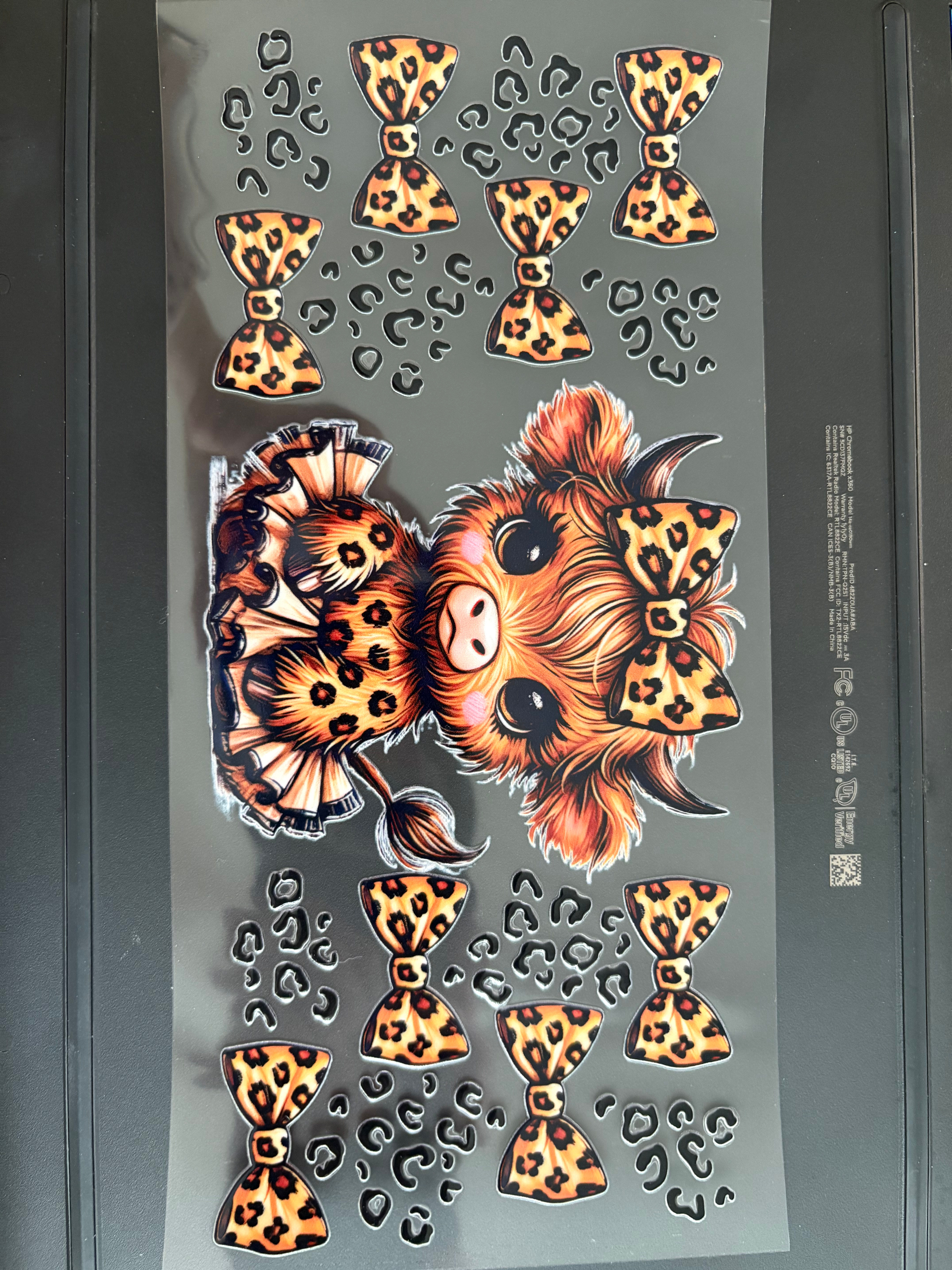 Leopard highland cow