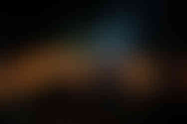 Nighttime vigil in Venezuela: Relatives hold candles and signs calling for the release of all political prisoners outside a prison in January 2026