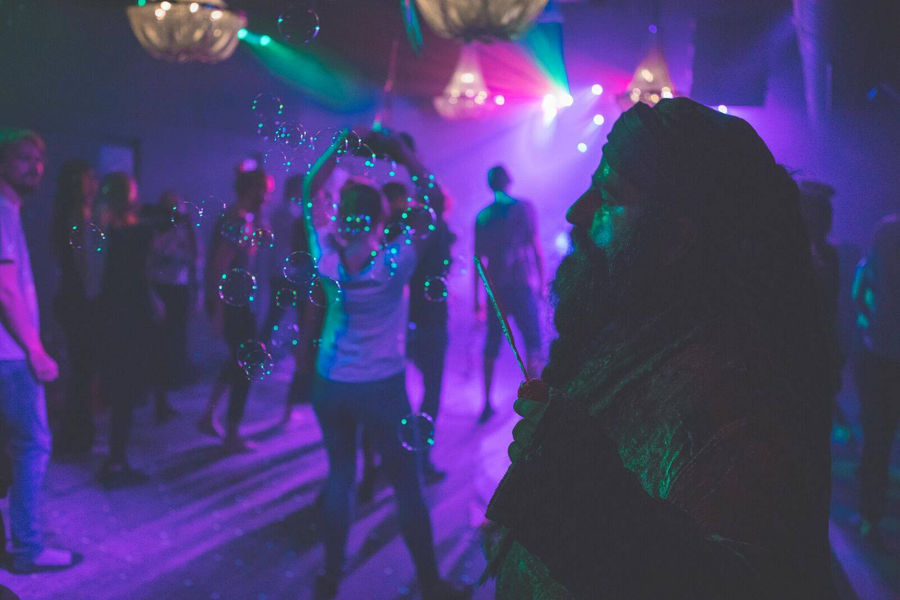 Dancers in purple light
