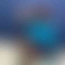 A mom and her child sitting by the exam table in the clinic.