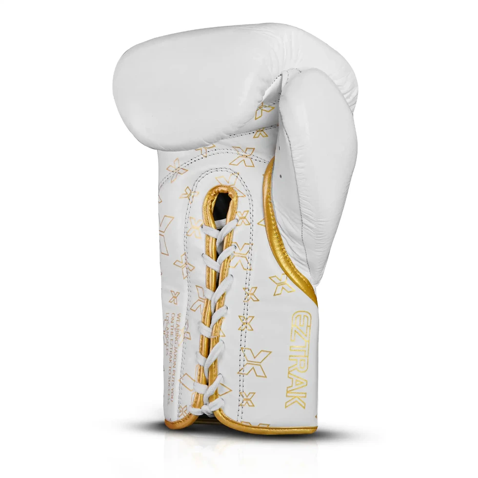 Side profile of JAXON EZTRAK premium leather lace-up boxing gloves in white and gold for professional fighters