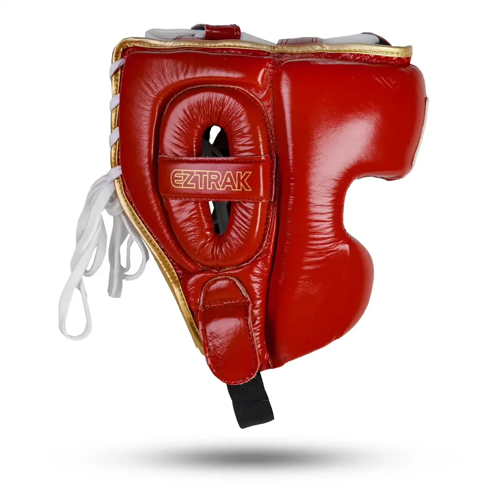 Red boxing headgear side view with reinforced ear protection and chin cup