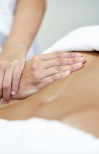 hands-massaging-female-abdomen-therapist-applying-pressure-belly.jpg
