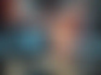 Computer monitor displaying a galaxy. Surrounding view shows a colorful, starry cosmic scene with planets. Keyboard on sleek desk. Space theme.