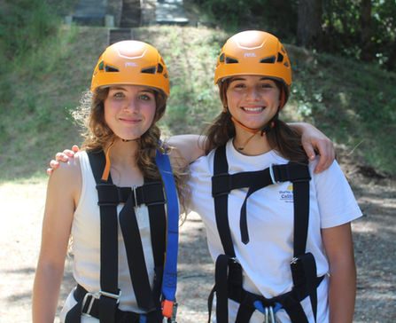 2 girls in zipline gear