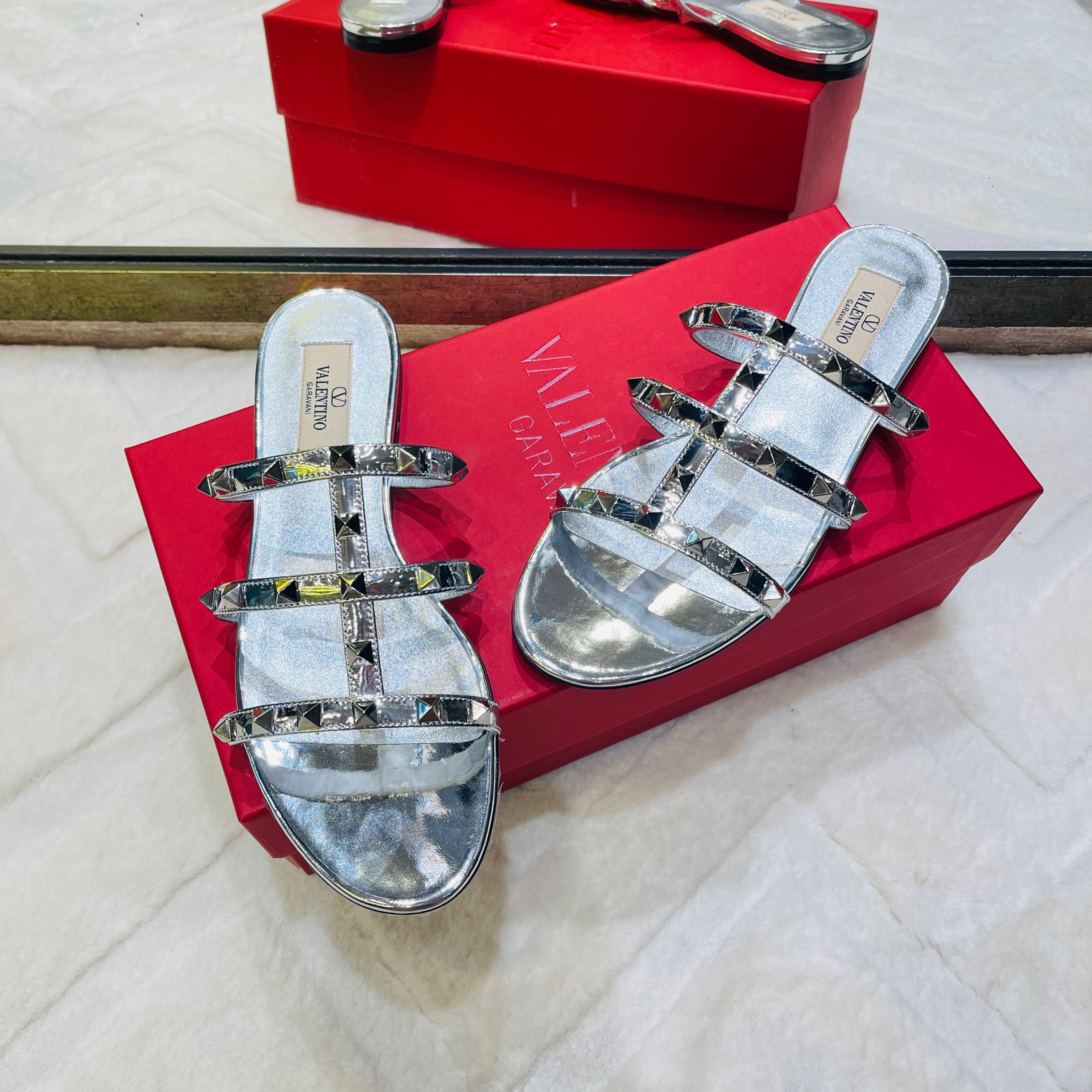 Valentino Rockstud slides in mirror silver