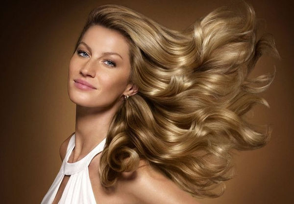Image of Gisele Bundchen, brazilian famous model / hair blowing in the breeze