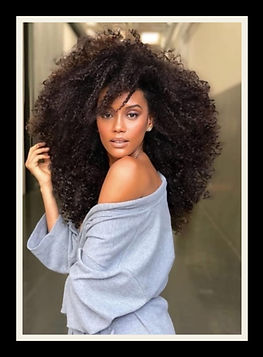 Portrait of Tais Araujo, a Brazilian actress, TV host and model / black skin and afro hair