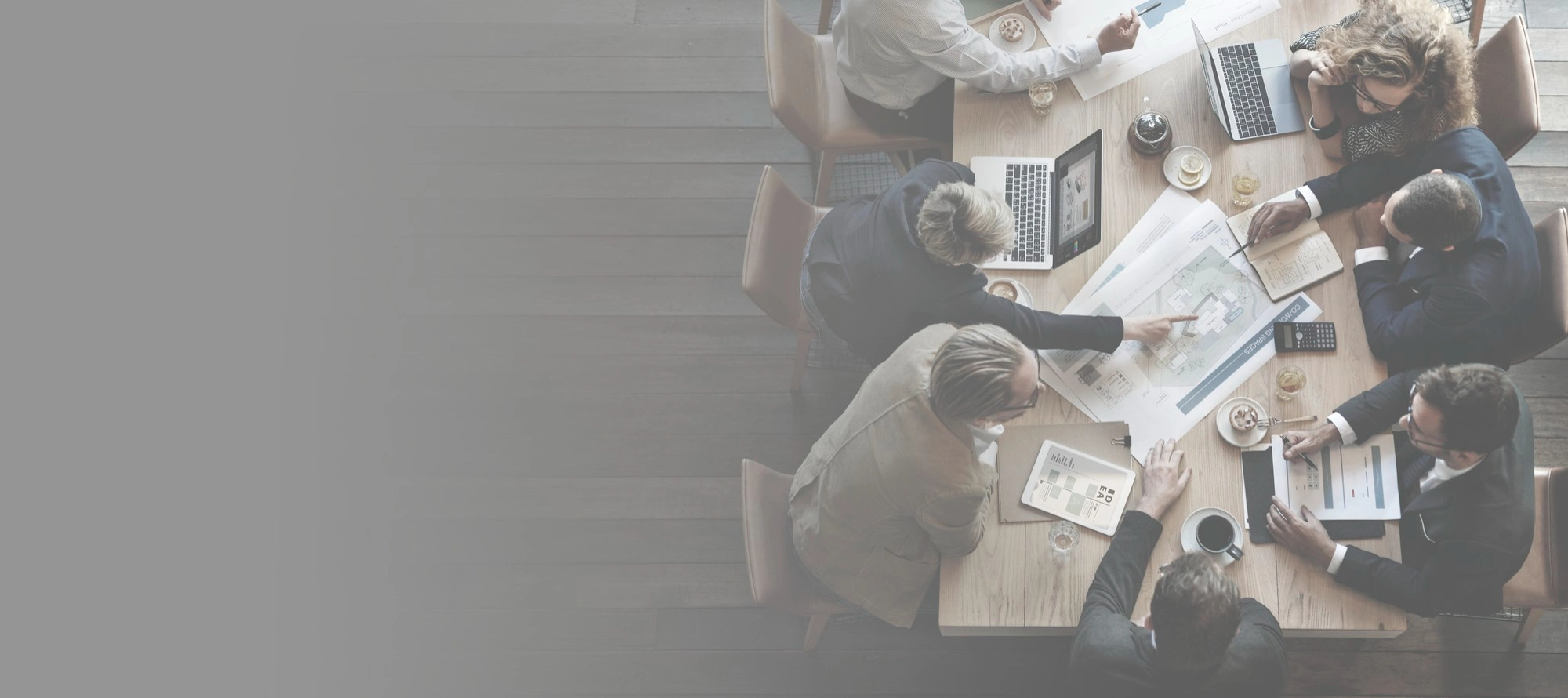 diverse-businesspeople-having-meeting.webp