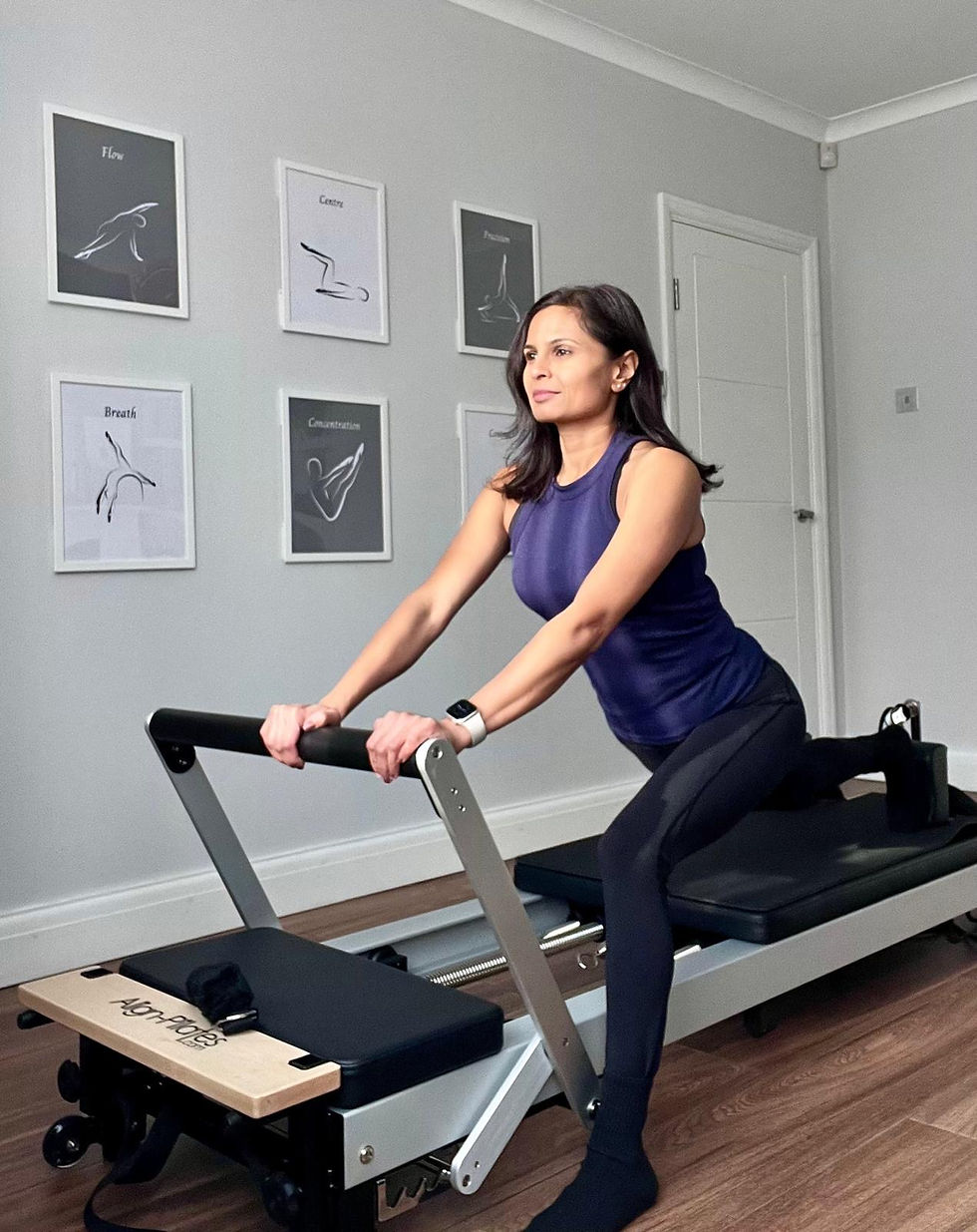 Close-up of Reformer Pilates equipment used for strength, flexibility, and injury recovery