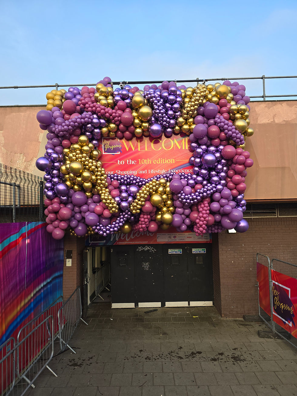 Colourful balloon backdrop setup for outdoor celebration in London