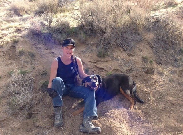 Erin, the ranch owner and gifted MFT therapist, with her dog