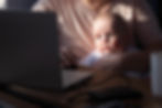 caucasian-babysitting-with-her-mother-using-laptop-2023-11-27-05-03-09-utc.jpg