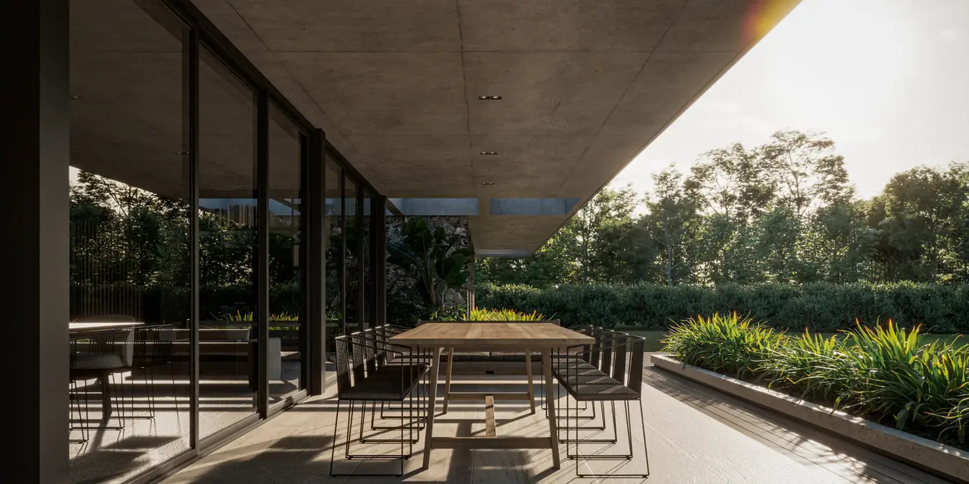 Galereia con losa de hormigon visto. El piso es de Travertino. Se ve una mesa de madera y las carpinterias de aluminio negro.