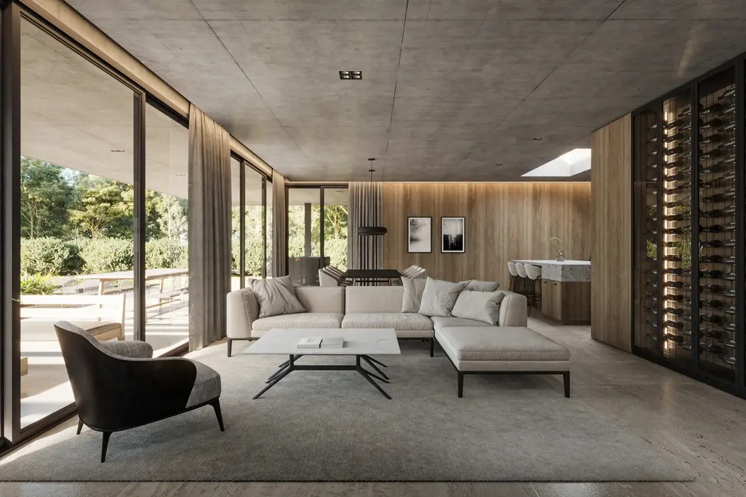 Casa con piso de travertino, losa de hormigon visto. paredes revestidas en madera. Es un living con muebles claros y una cava de vinos.