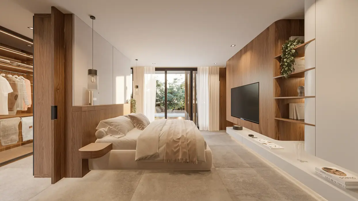 Dormitorio principal el piso es de porccelanato. Se ve el vestidor. El mueble de la tele es curvo en madera y laca blanca.