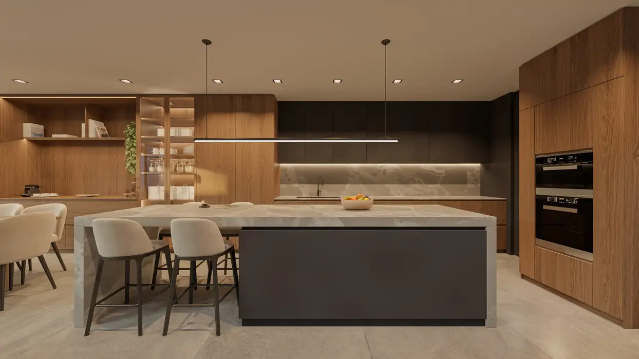Cocina con Isla en marmol con banquetas. Muros revestidos en madera y laca negra.