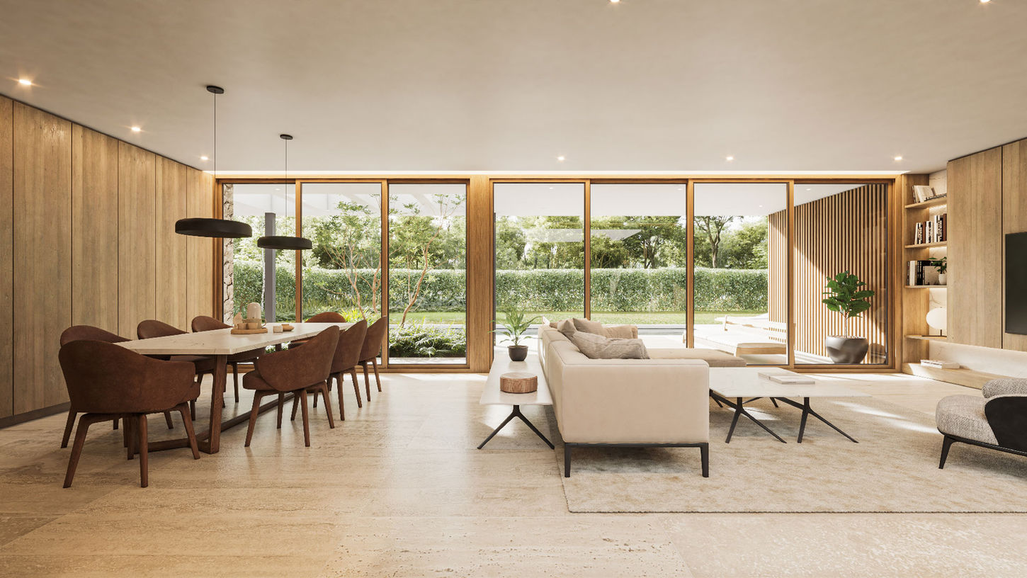 Estar comedor integrado con galera. Ventanas de piso a techo que aportan gran luminosidad, la casa está en Buenos Aires. El piso es de travertino y el mobiliario es claro. Las paredes estan forradas en madera.