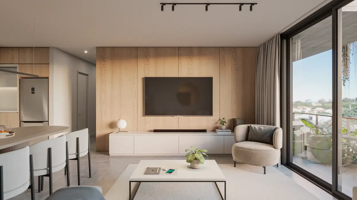 estar comedor con muebles claros, cocina integrada y ordenador de tv.