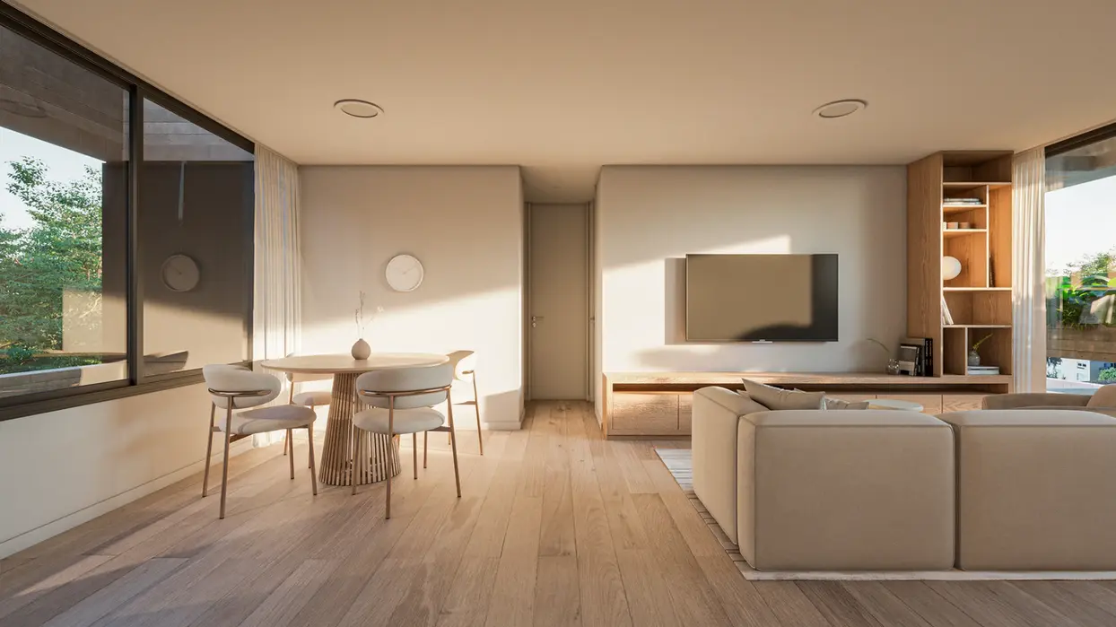 estar comedor integrado con cocina, los pisos son de madera y los muebles de cocina tambien. los muebles son claros.