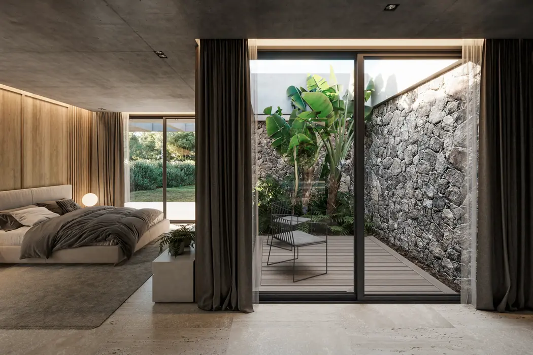 Casa con piso de travertino, losa de hormigon visto. paredes revestidas en madera. Dormitorio principal con patio interior.