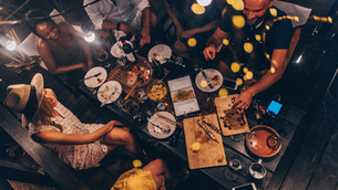 People having a dinner party