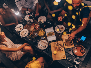 People having a dinner party