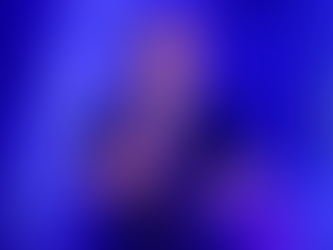 Drake talking on a mic with a blue and purple background
