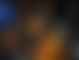 Kerry Washington smiles while speaking into a microphone during her guest appearance on The Breakfast Club radio show, seated in a studio with branded signage and cultural memorabilia in the background.