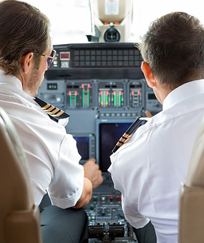 pilot-and-copilot-in-private-jet-cockpit