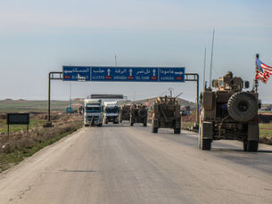 US military convoy operating in the Middle East illustrating American regional military presence
