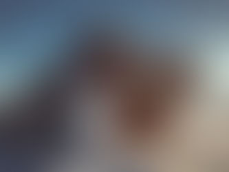 Tracked vehicle operating on Arctic ice in Greenland, highlighting infrastructure and logistical access