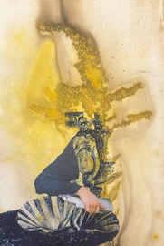 Person in dark clothing with a fish graphic, holding a silver fish against a yellow abstract background.