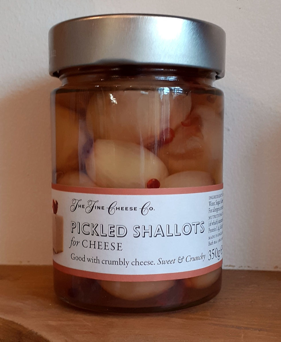Thumbnail: jar of pickled shallots on a wooden shelf